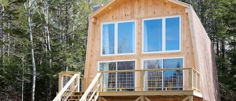 Discover this log cabin nestled in the woods.