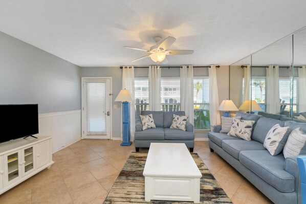 Spacious living room with sleeper sofa! This unit sleeps 6 people.