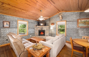 Living Room with Gas Fireplace - Couch with two Recliners and Couch with pull out sofa bed.