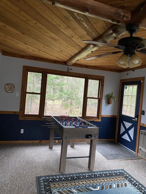 Large sunroom with foosball table