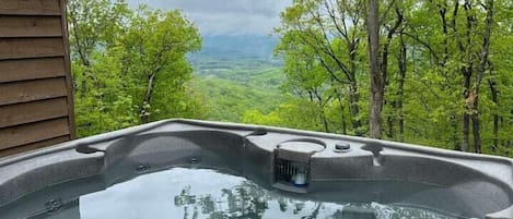 Nature's therapy: Take a dip in the 4-person hot tub, surrounded by the beauty of the mountains.