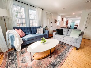 Living room opens to kitchen