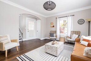 Spacious Entryway with Open Floor Plan and Hardwood Floors