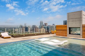 Communal rooftop pool with incredible views of Austin.