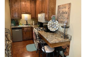 Kitchen with stove/oven, microwave, mini fridge, Keurig
