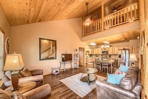 Beautiful Living room with views of the Upstairs loft!