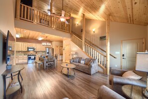 Beautiful open living room/kitchen area/loft.