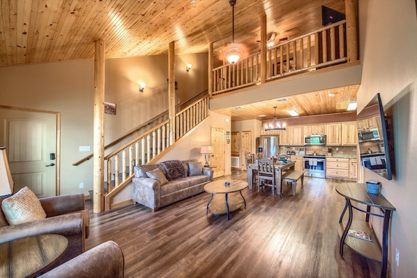 Beautiful open living room/kitchen area/loft.