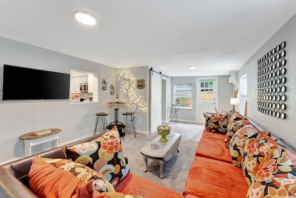 Spacious living room with smart HD TV