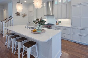 Large kitchen with Wolf Range & Sub Zero Refrigerator 