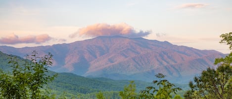 Stunning mountain views from the log cabin deck.