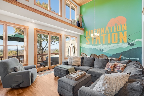 Get comfy and enjoy the scenic views from this spacious living room!