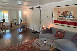 Living Room into Dining room. Office behind barn door