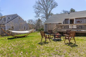 Backyard with fire pit and hammock