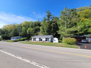EXTERIOR:  Looking at the cottage from the road.