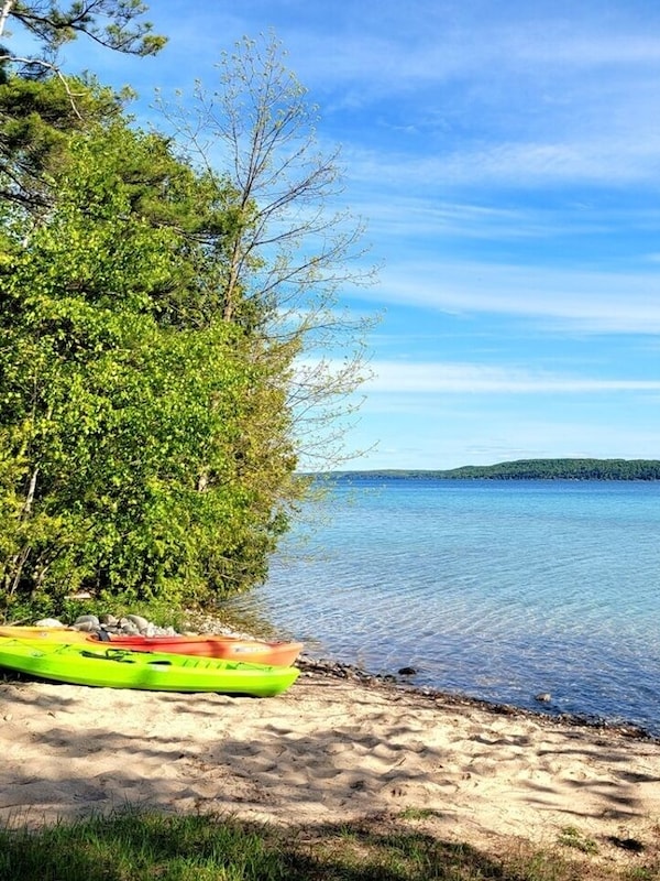 EXTERIOR: The private beach and the 2 kayaks that are available for guests to use.