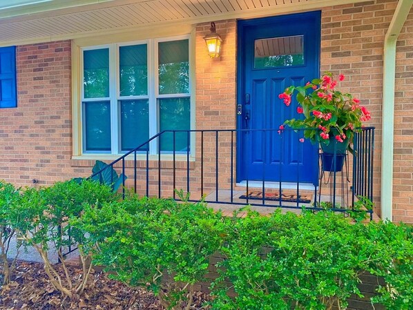 Front of House with keyless entry and door camera. 