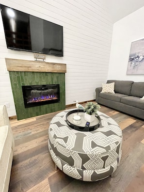 Electric heated fireplace and smart TV in living room