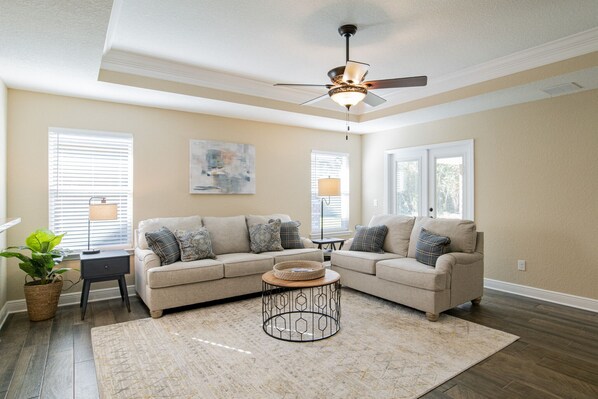 Unwind in the private Living Room, a cozy sanctuary for relaxation and quality time.