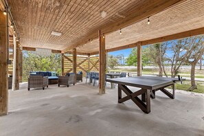 Seating area for 14, Dining table for 10, Ping pong table