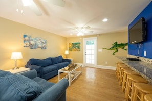 Bar seating, access to the kitchen, and streaming HULU make this a spot to relax.