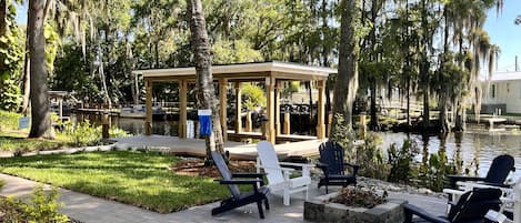 Back Yard View of Fire Pit and Boat Dock