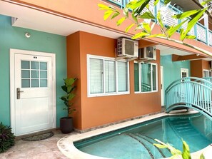 Relax in our shared lagoon pool just outside the entry door. 
