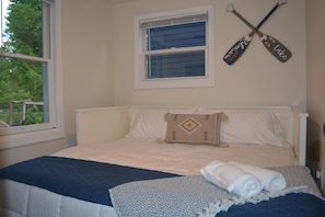 Second bedroom with bed expanded to a king size.