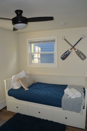 Second bedroom with twin trundle bed (converts to king size bed).