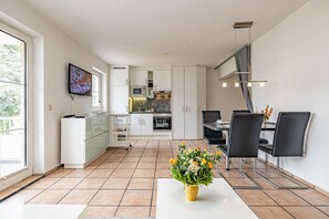 open living room to kitchen and dining area