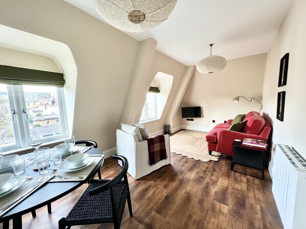 Living Area with Double Sofa Bed and Smart TV