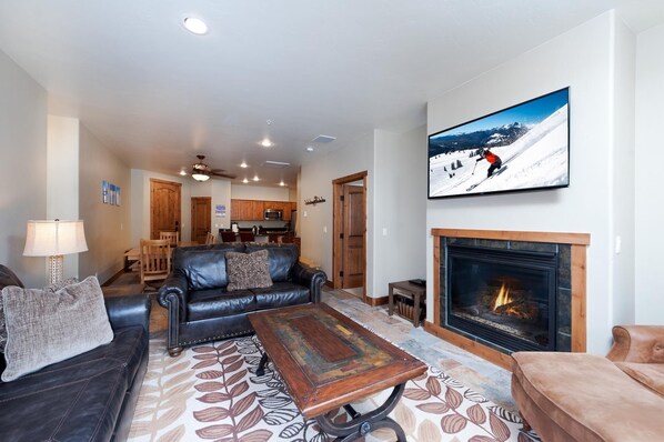 Main Living Space, Dining and Kitchen with TV, Gas Fireplace and Deck