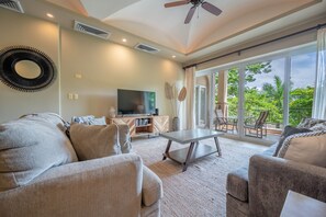 Savor that feeling of vacation refreshment in our bright living space and take your pick of enjoying the lush view or your favorite TV show!