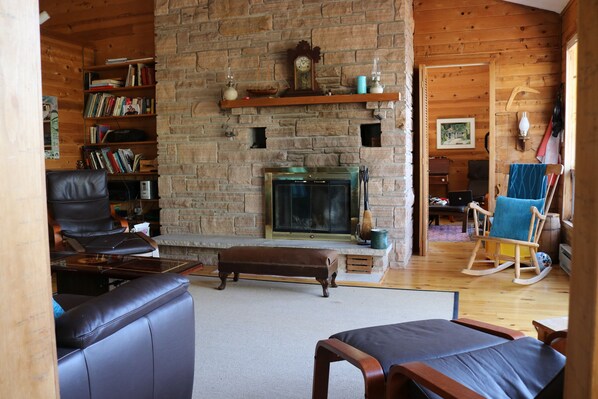 Living room fireplace, view into den / office
