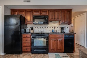 Freshly remodeled kitchen with custom cabinetry.