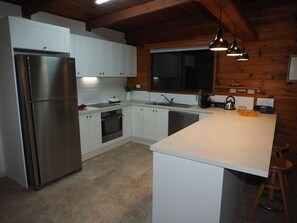 Kitchen - large fridge/freezer, induction cooktop, Asko oven