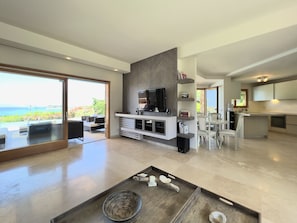 View of fireplace and living area