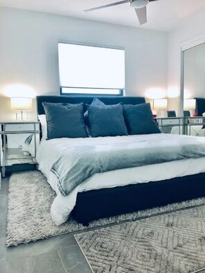King size bed and closet in the bedroom.
