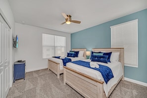 Comfort and companionship await in our cozy twin single beds setup, perfect for friends or family.