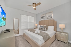 Serene and elegant, our white-themed master bedroom offers a tranquil escape.