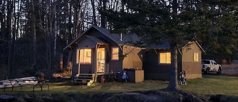 Cabin at night from the lake 