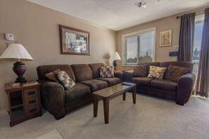 Enjoy relaxing in the living room, which has a sofa pullout bed that sleeps up to two people.