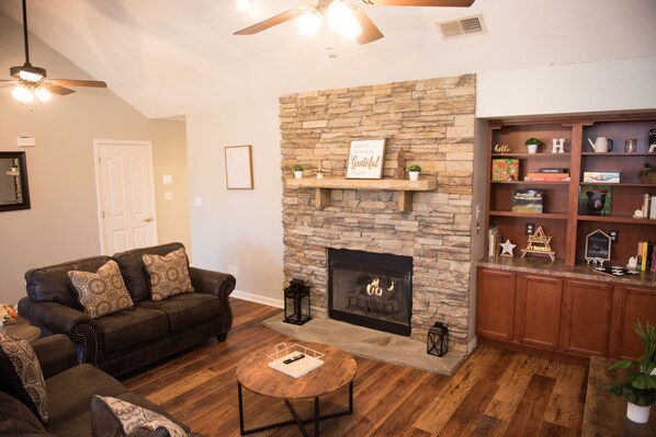 The gas fireplace with it's rock surround is great for cozy nights.