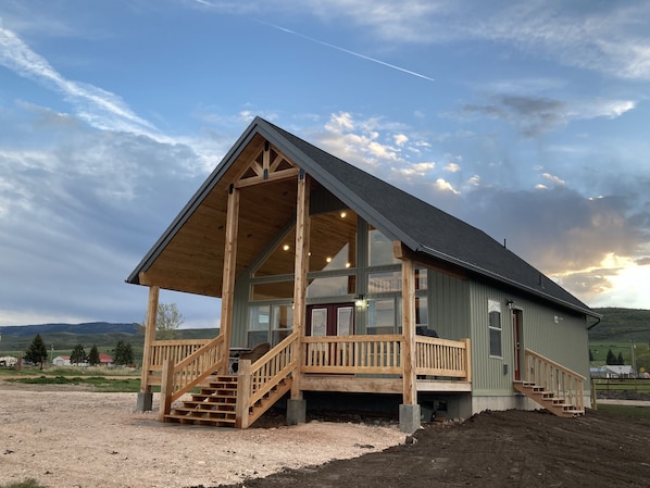 Front of the cabin. Deck is East facing with a view of Bear Lake.