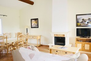 Sink into the cozy sofa after a day exploring the area.