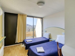 Relax on the comfy bed after a day outside.