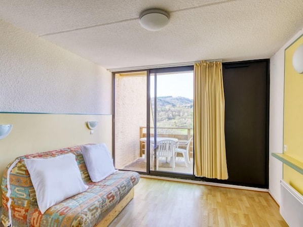 Sink into the cozy sofa after a day exploring the area.