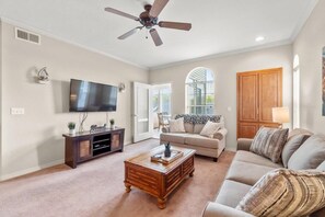 Living area includes a TV set with Cable services.