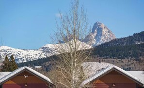 Take in gorgeous views, including a peek of the Tetons, from the living room or either bedroom.