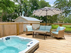 Enjoy a soak in the 6 person hot tub